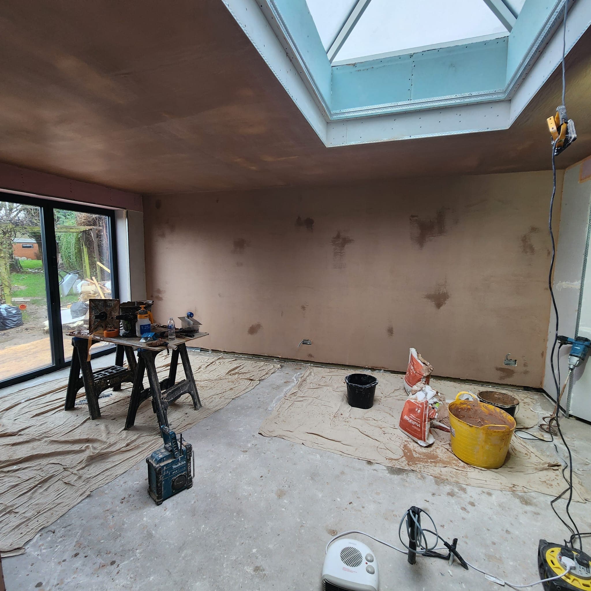 Freshly plastered, skimmed room by JD Projects in West London